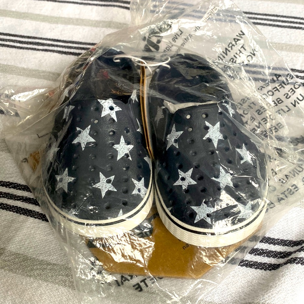 Never worn! Native shoes for little kid!